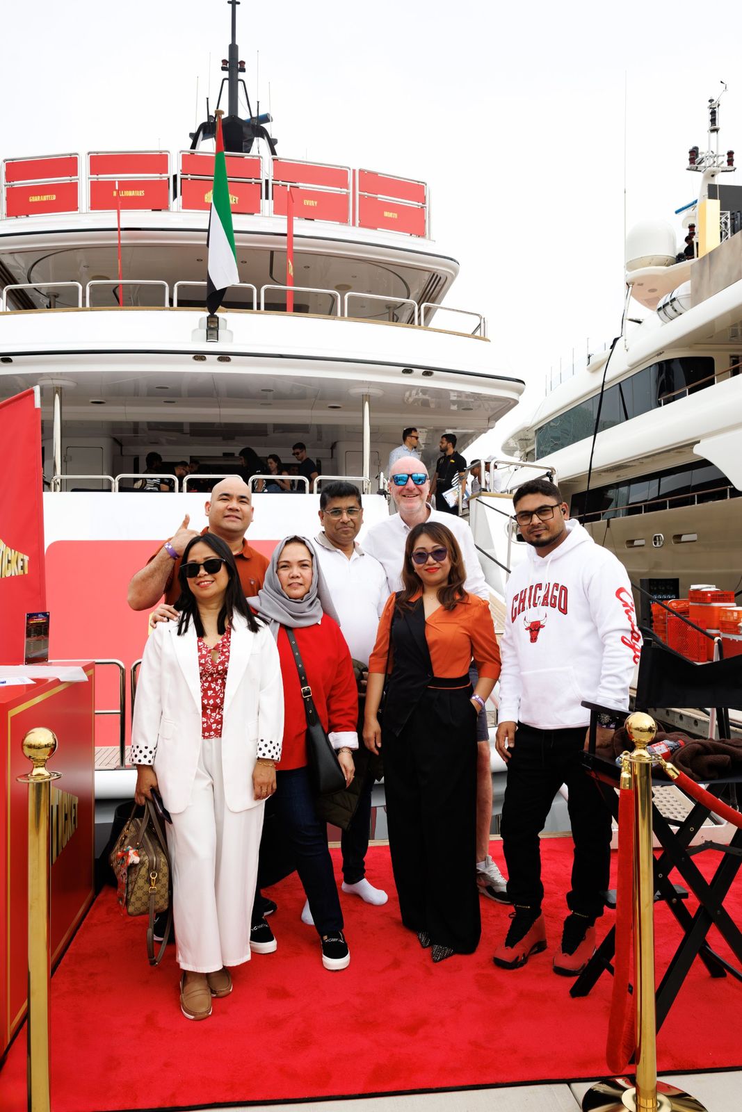 Red-carpet welcome in front of the Big Ticket superyacht