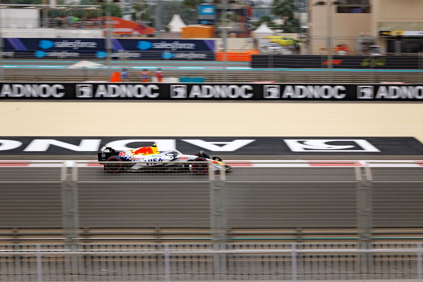 A car passing on the Yas Marina circuit seen from the yacht