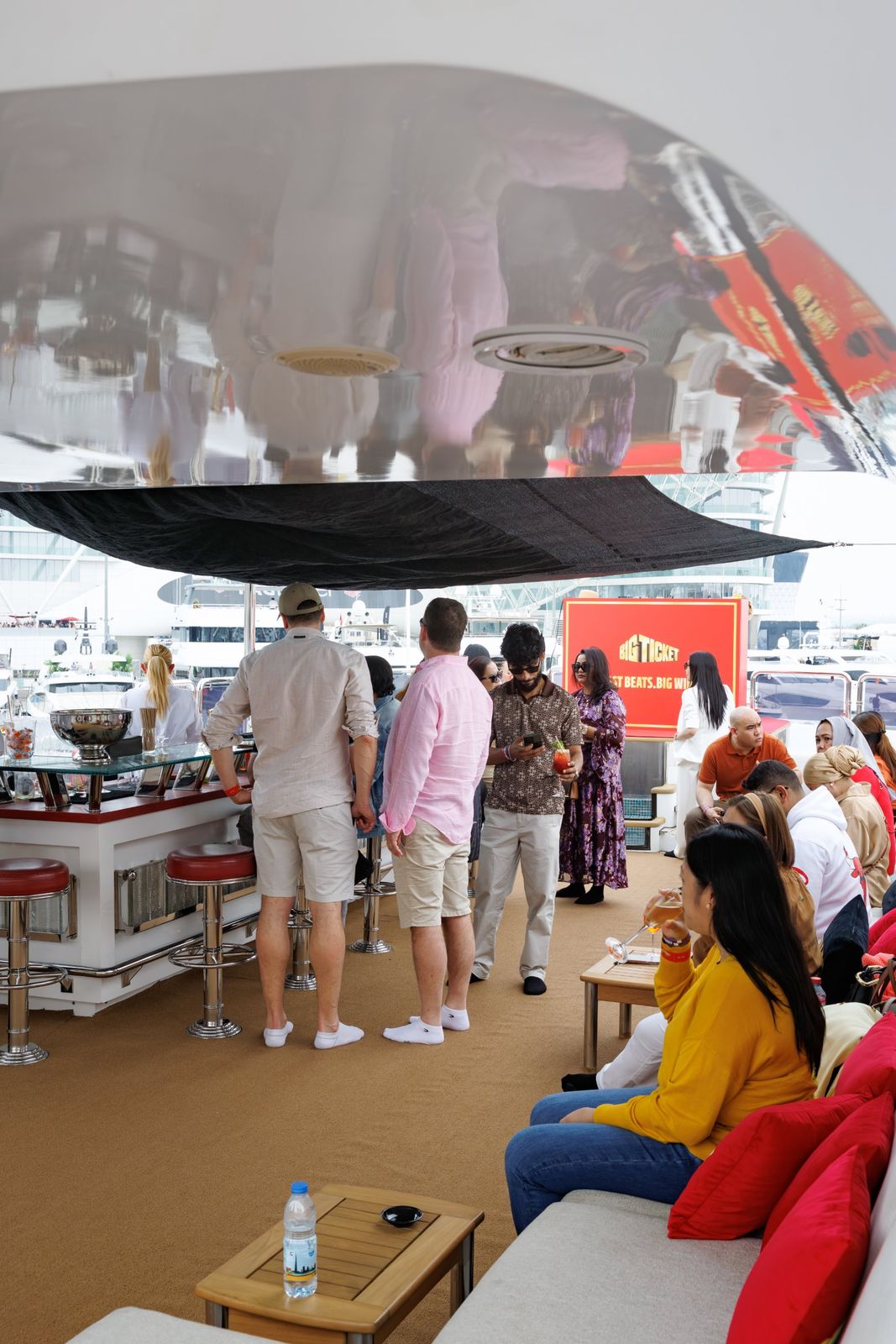 Guests on the upper deck of the Benetti