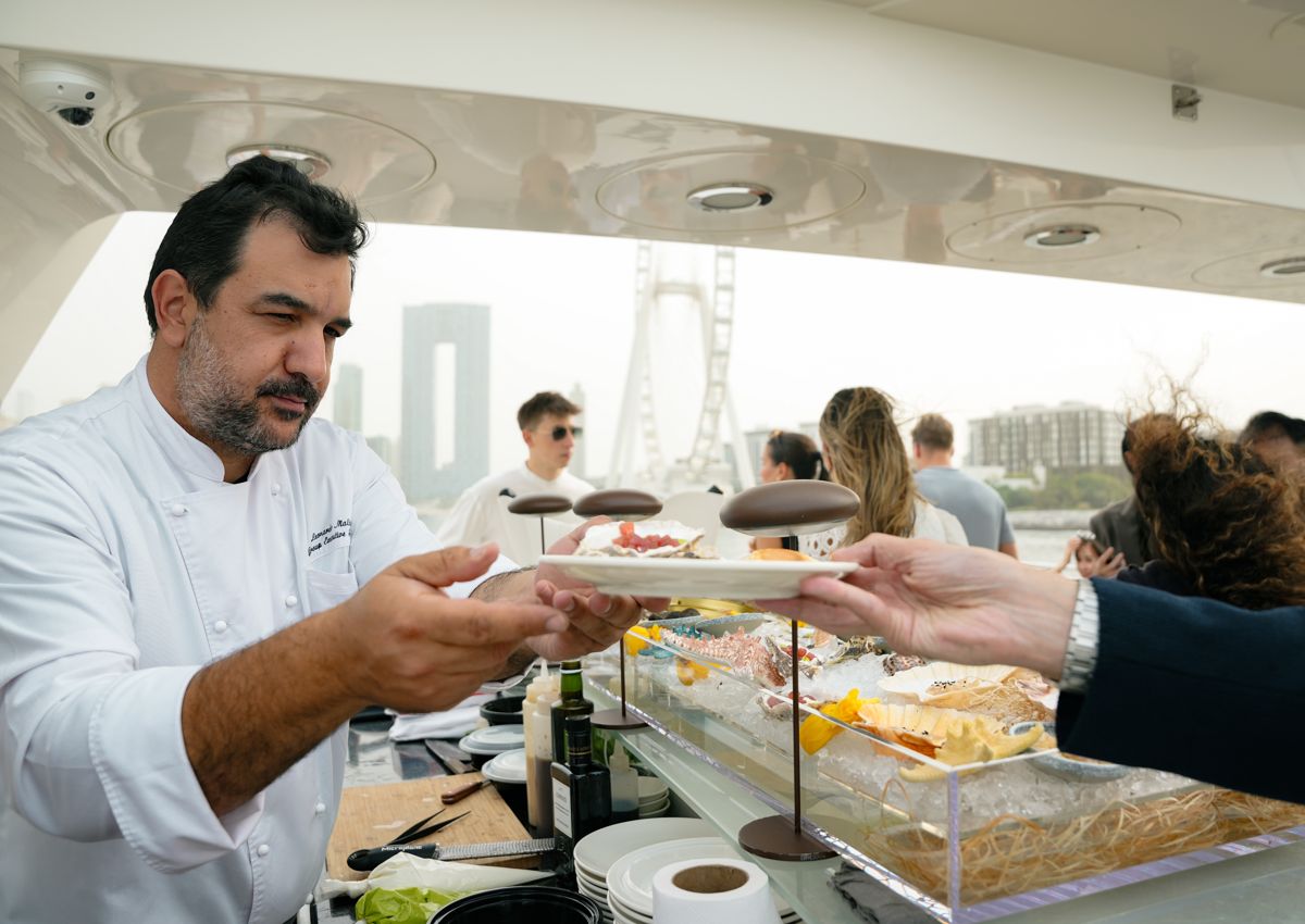 Live raw bar with oysters and caviar on the deck of a superyacht