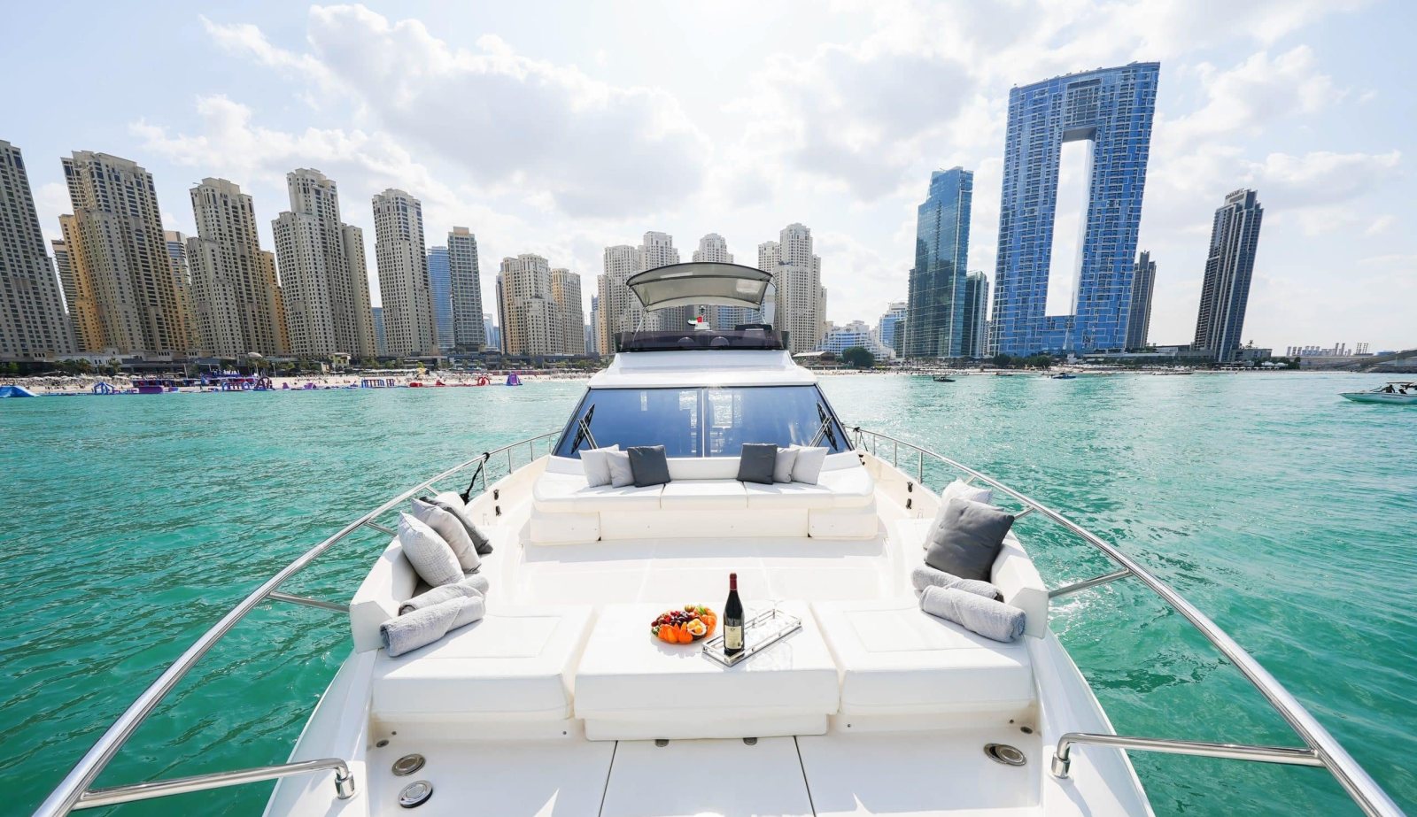 Ferretti 670 foredeck lounge facing the JBR skyline