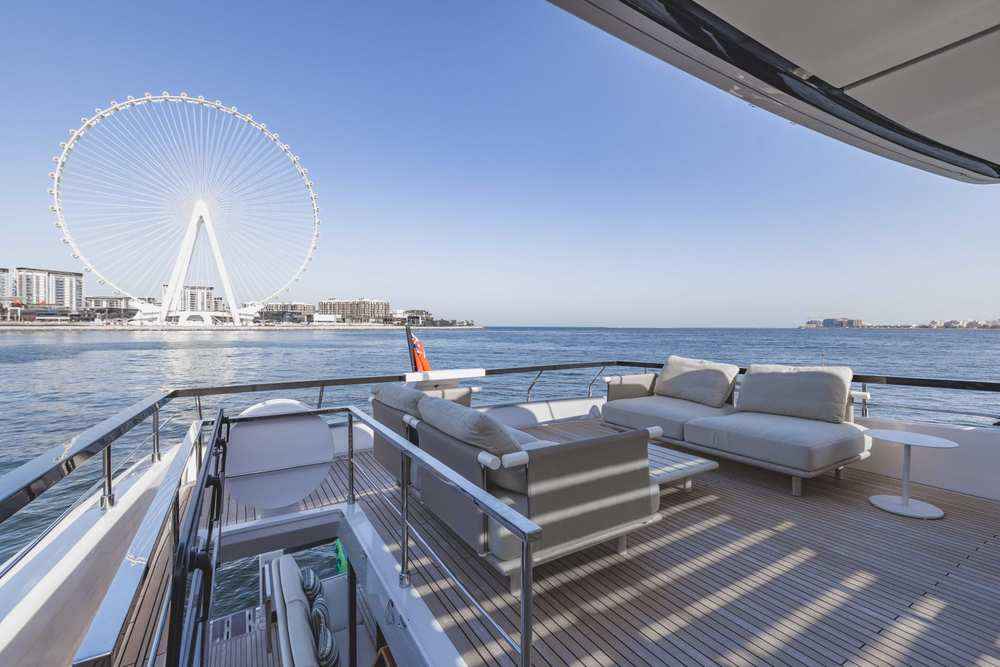 Ferretti 860 flybridge lounge facing Ain Dubai Ferretti 860 flybridge lounge facing Ain Dubai