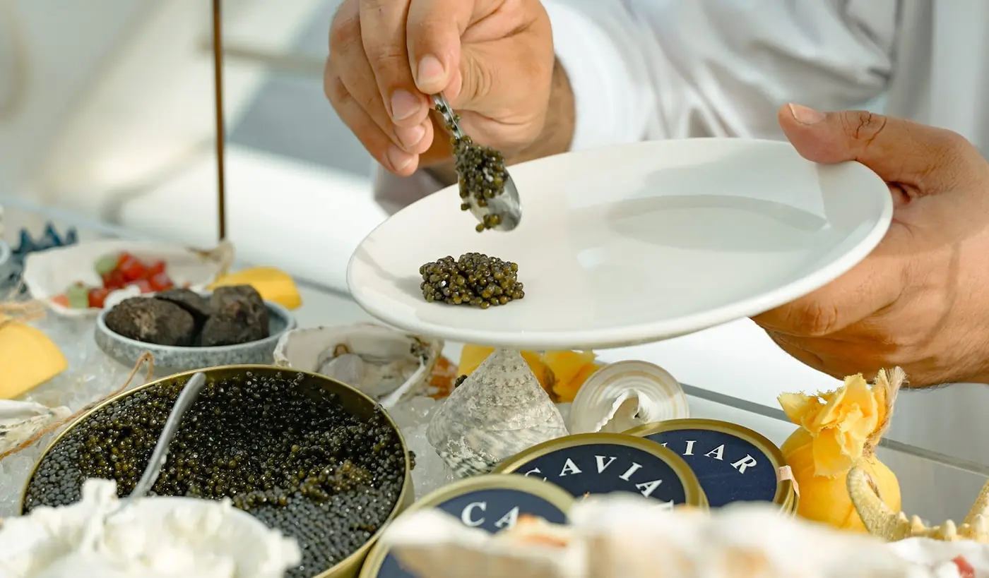 Caviar and Champagne served on a superyacht at Yas Marina