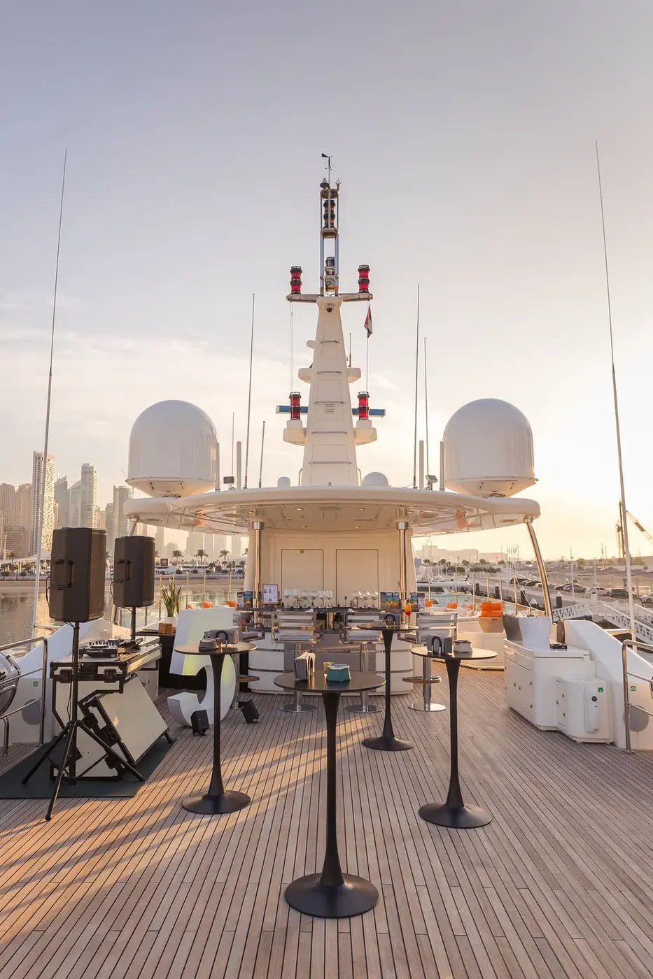 Guests relaxing on the deck of a superyacht in Yas Marina