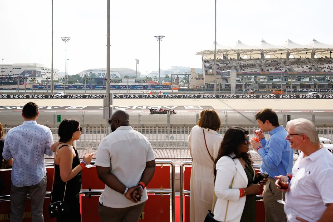 Corporate guests watching the Abu Dhabi Grand Prix from the deck of a superyacht