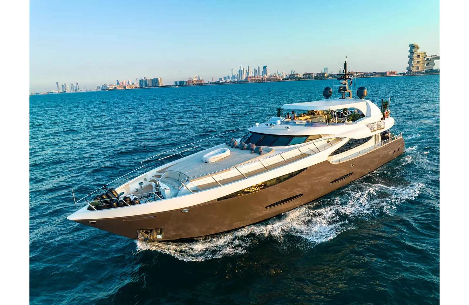 Khalili with its sculpted dark hull at sea