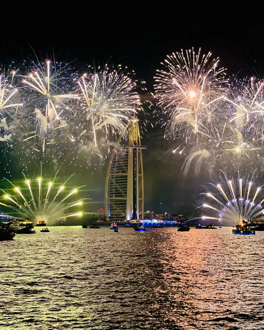 Fireworks over the Burj Al Arab seen from yachts at sea