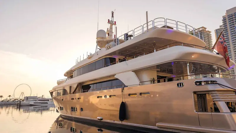 Private superyacht moored in Dubai at golden hour