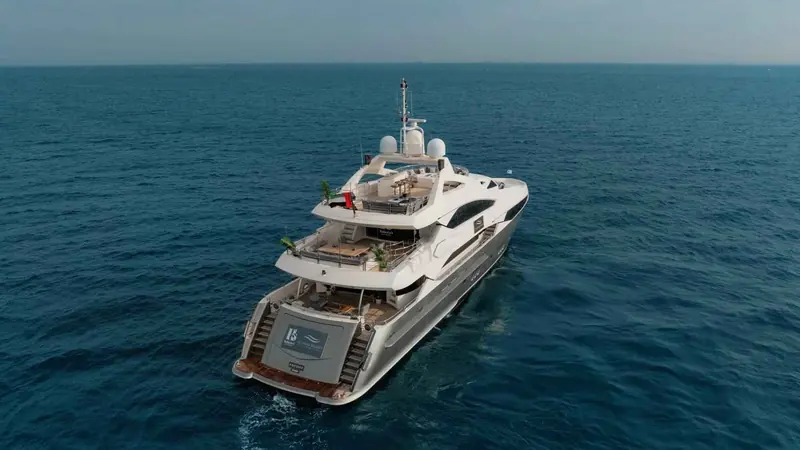Aerial view of a private superyacht cruising off Dubai