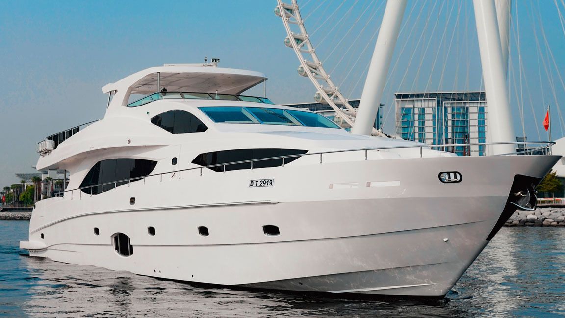 Icon, 110 ft Nakheel motor yacht at sea near Bluewaters, bow and flybridge