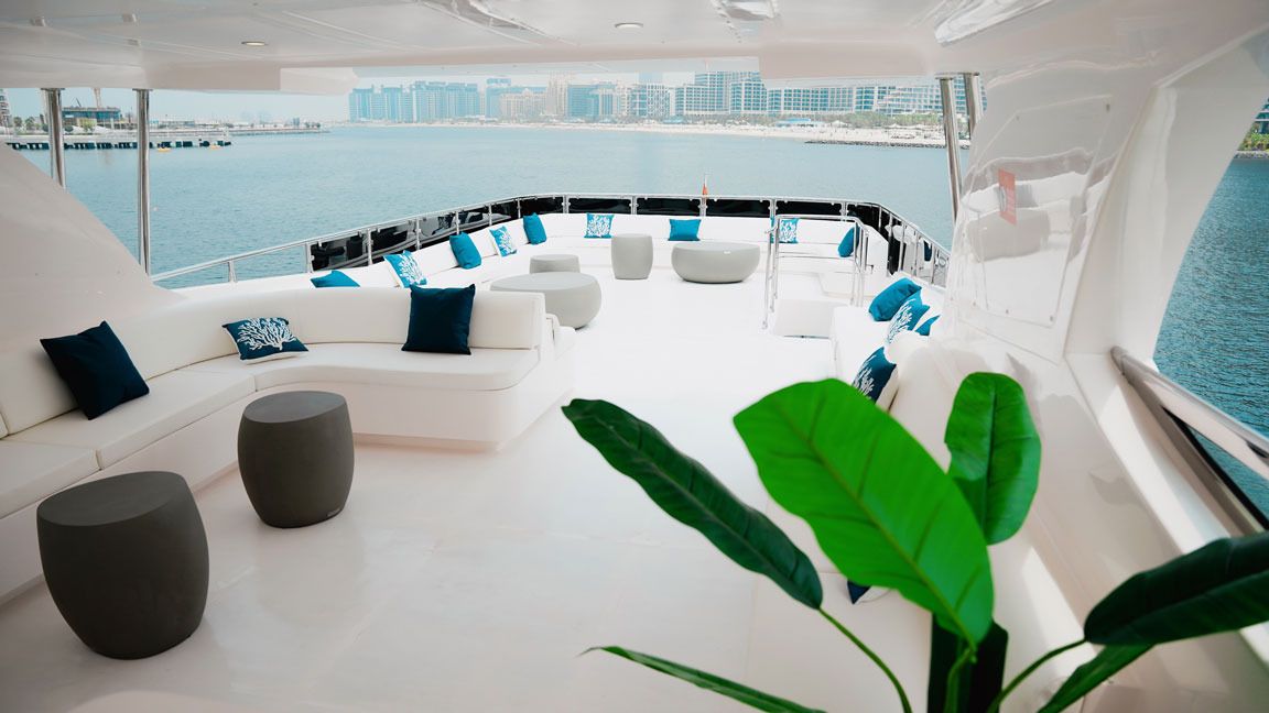Icon shaded upper deck lounge with white sofas