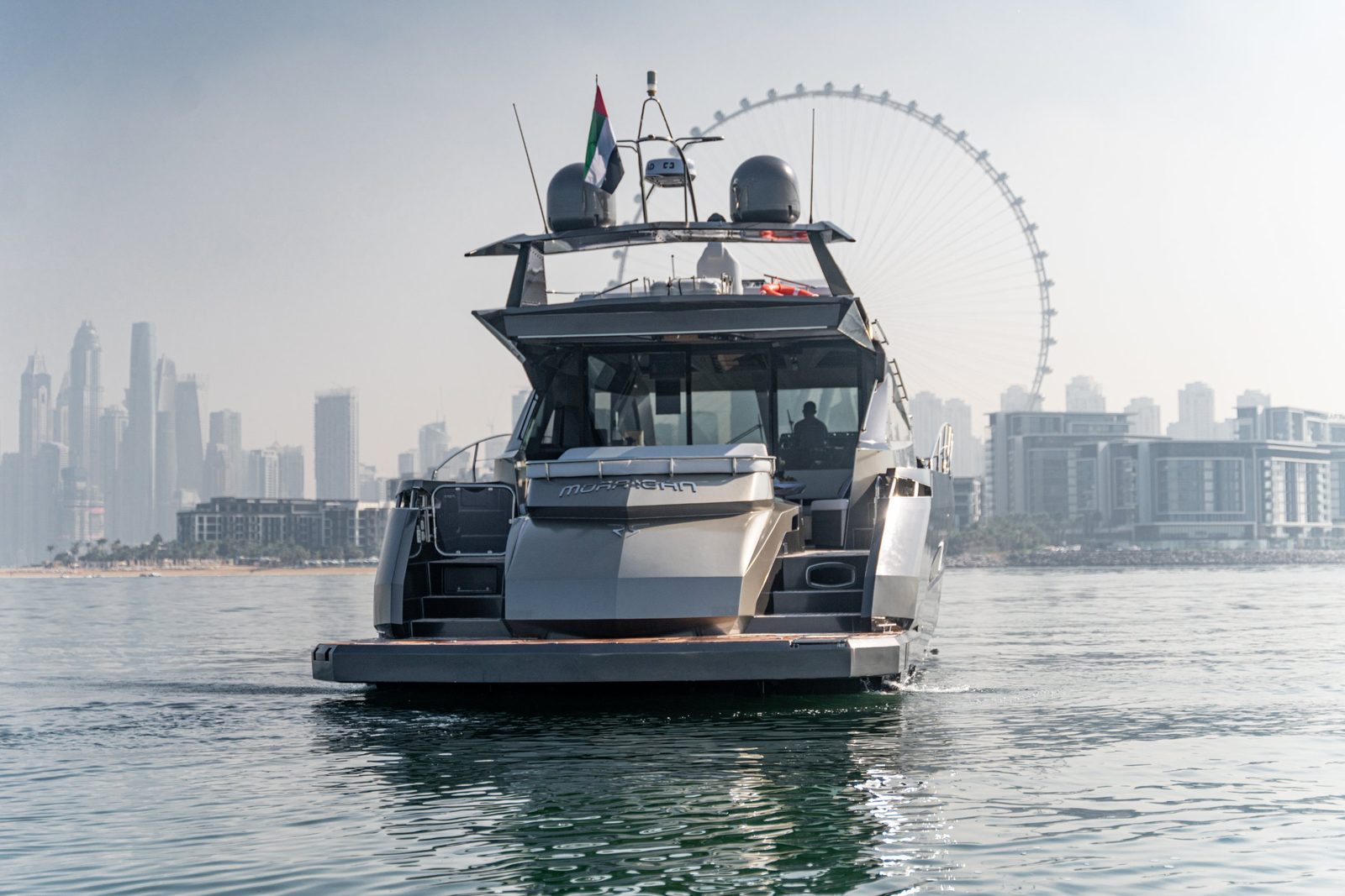 Morrigan at sea with Ain Dubai and the JBR skyline