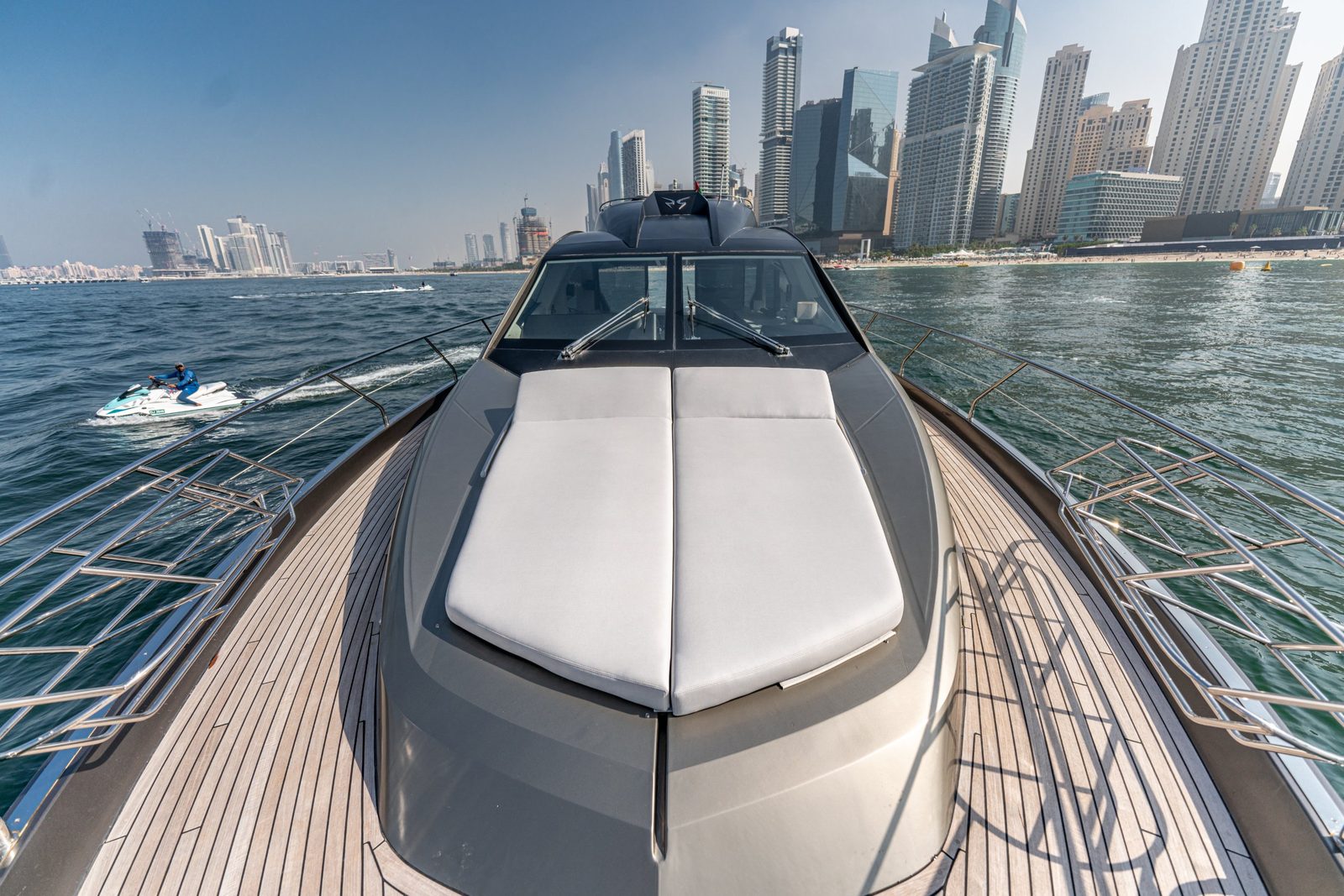 Morrigan foredeck sunpad facing the JBR skyline