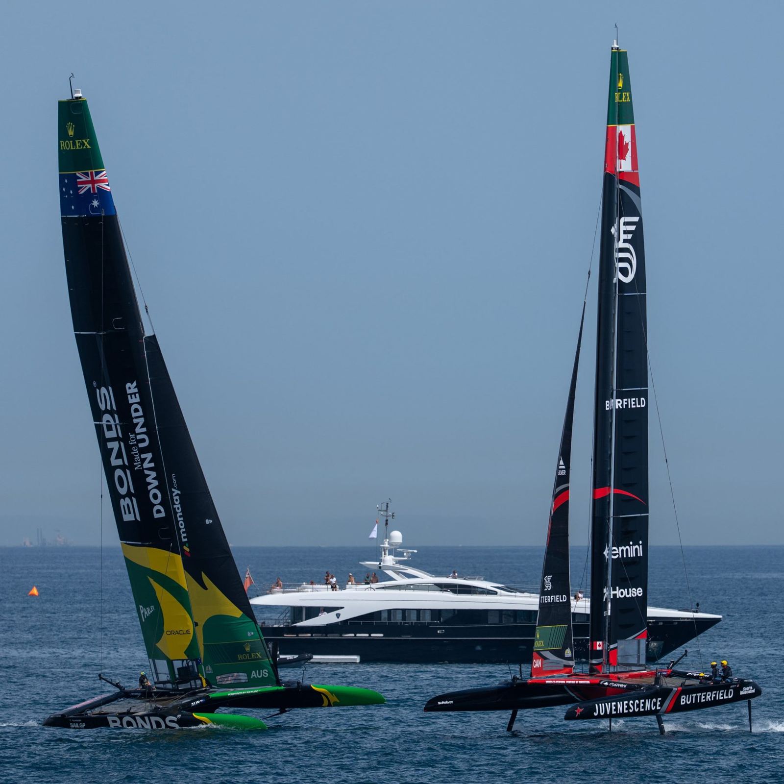 An F50 catamaran foiling at full speed during a SailGP race