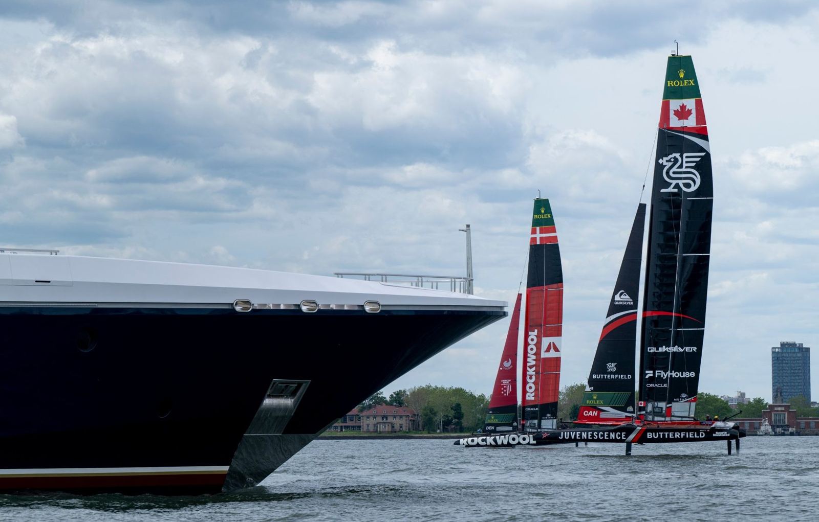 Bow of a SailGP F50 catamaran lifting out of the water