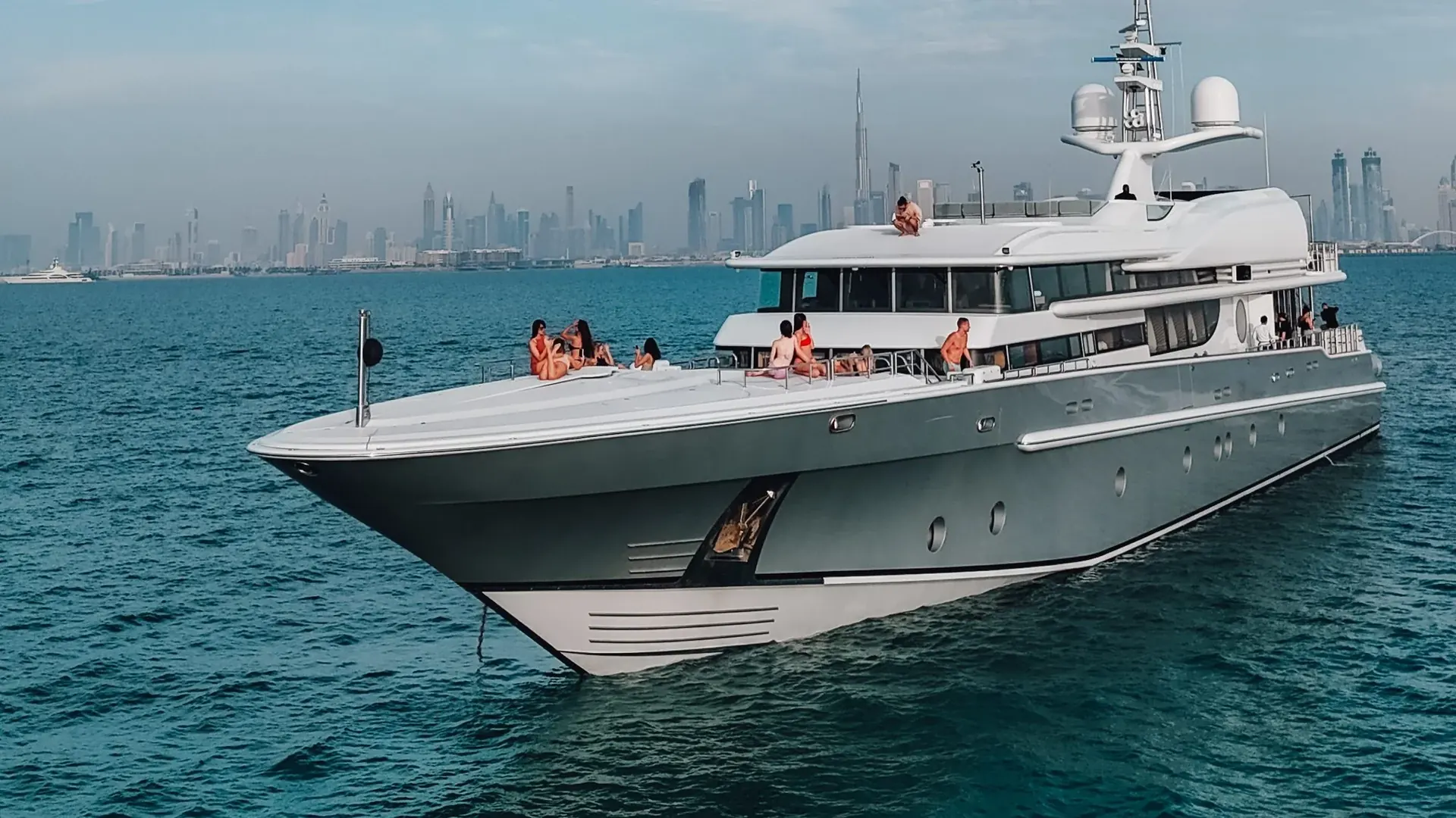 A superyacht cruising on open water off Dubai